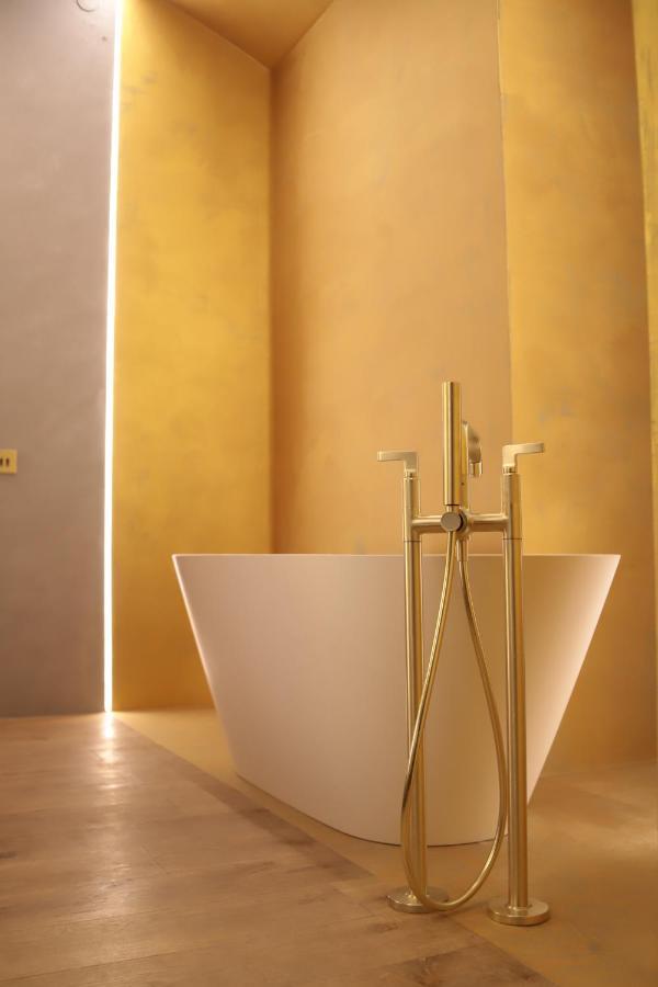 The Veil Hotel Astana Buitenkant foto A modern freestanding bathtub