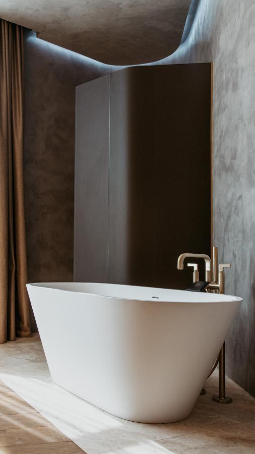 The Veil Hotel Astana Buitenkant foto A modern freestanding bathtub