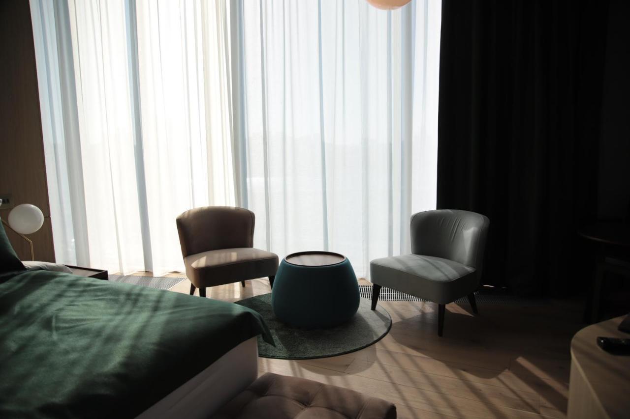 The Veil Hotel Astana Buitenkant foto A room at the hotel