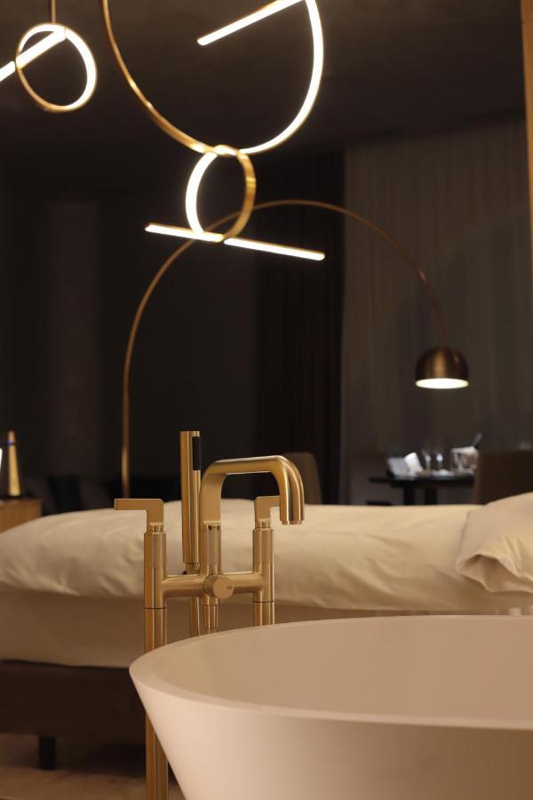 The Veil Hotel Astana Buitenkant foto A floor lamp